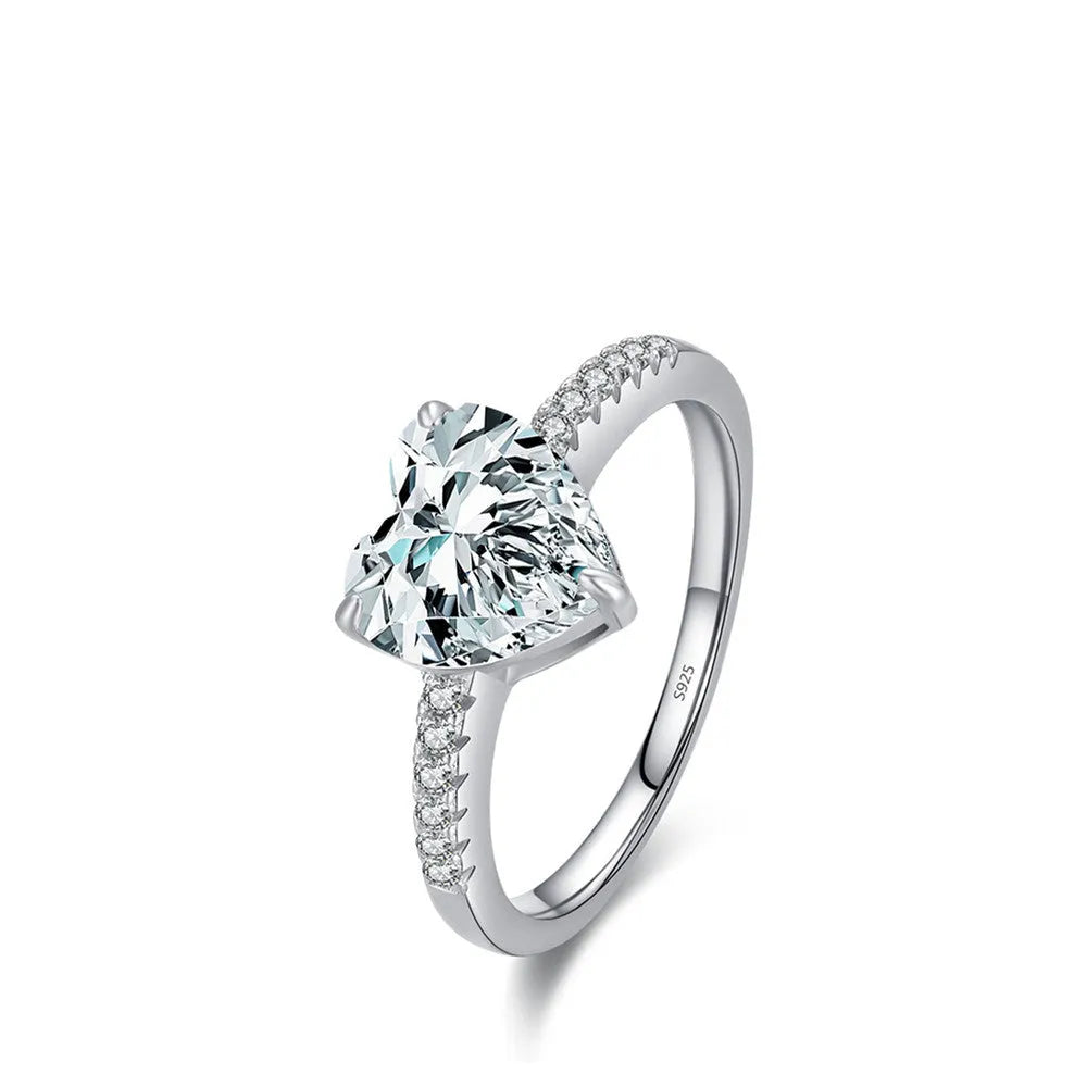 Women's sterling silver love ring with heart-shaped zircon stone in white color on display