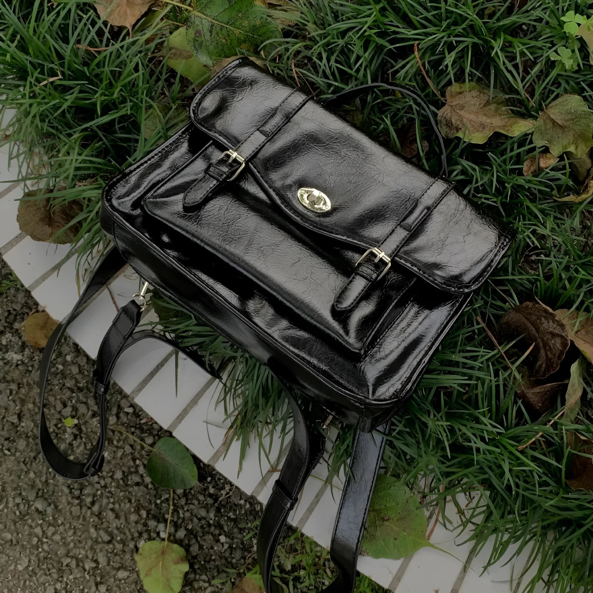 Black college messenger bag with oil wax PU leather finish showing 35cm length dimensions