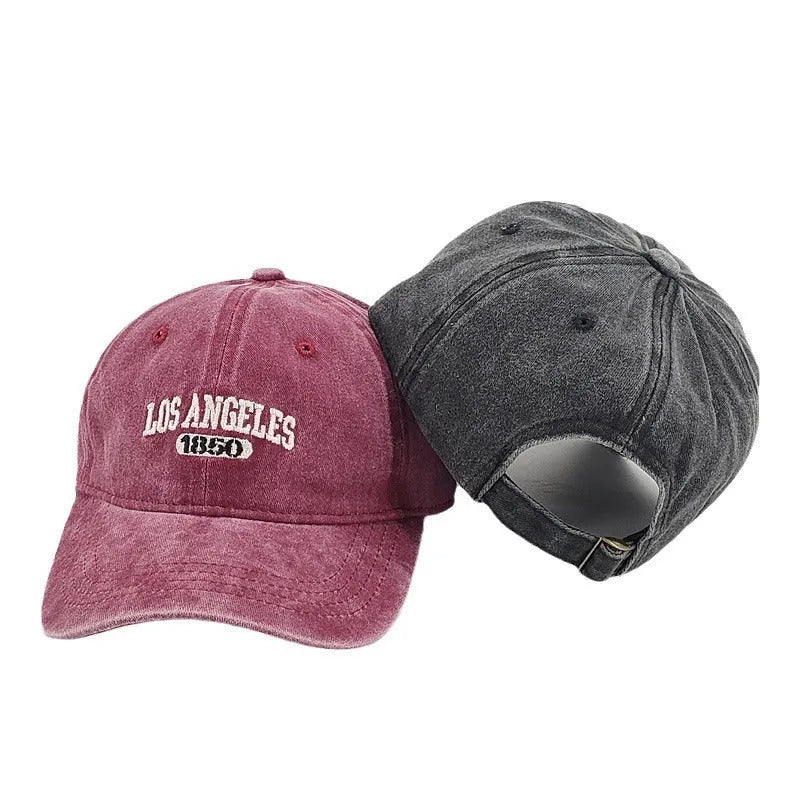 Retro peaked cap with distressed letter embroidery in conical crown style, adjustable 54-59cm fit