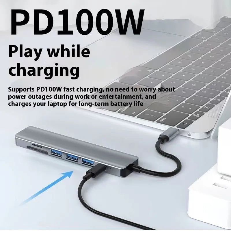 Type-C 7-in-1 expansion dock with HDMI port, USB 3.0 ports, card reader, and a 15 cm cable.