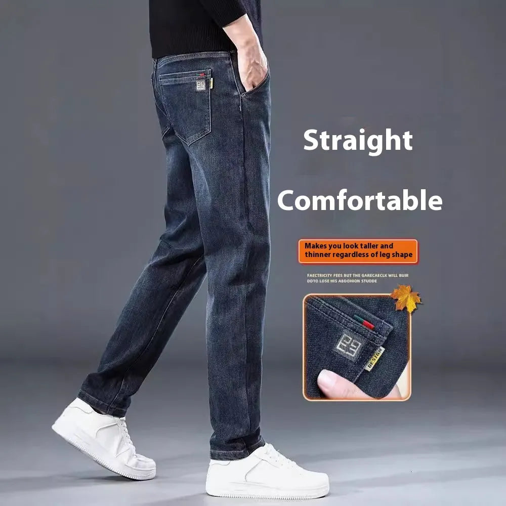 Blue grey slim straight leg casual trousers on a hanger, showing the mid-rise waist and zipper fly.