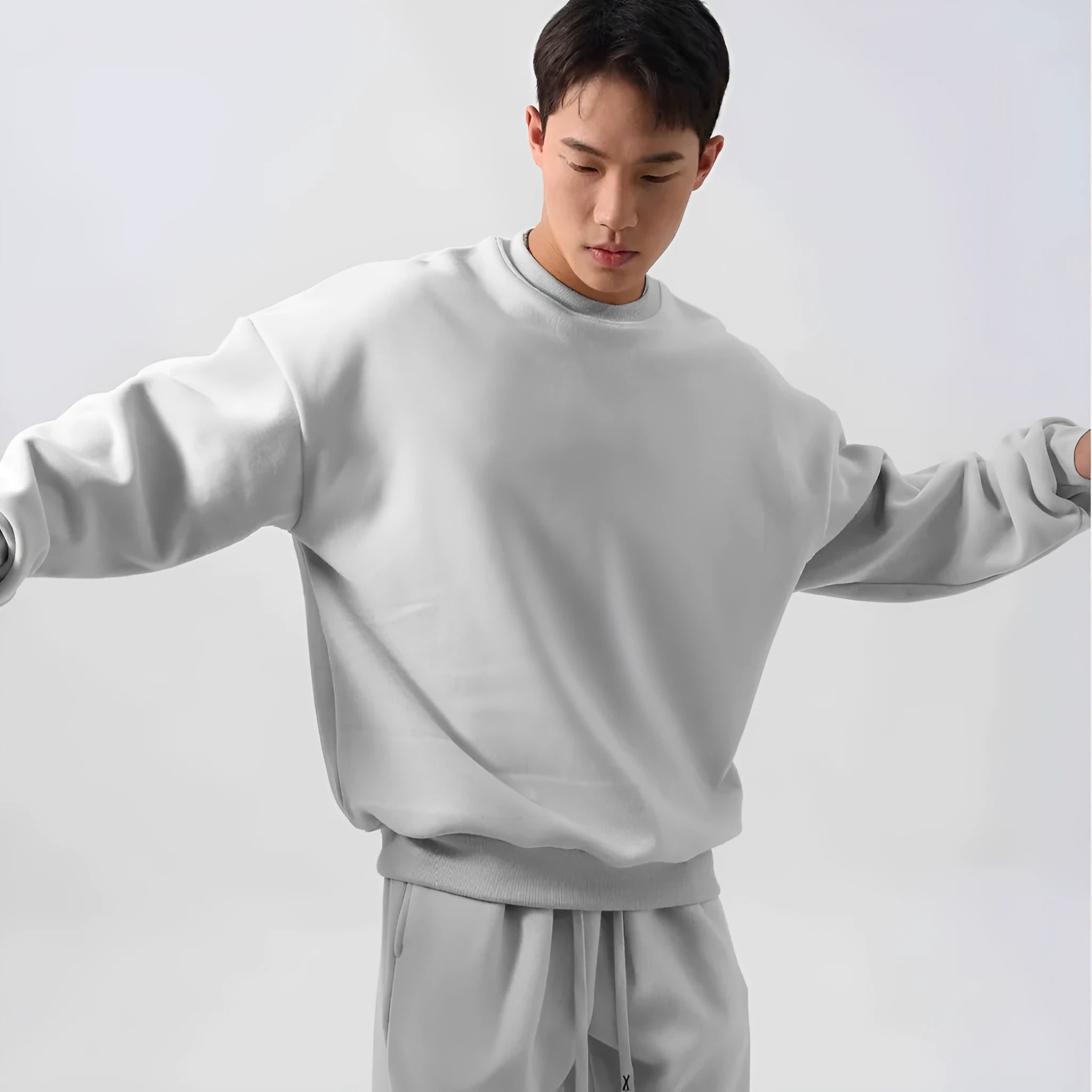 Men's polar fleece sports suit set showing jacket and trousers in winter colours