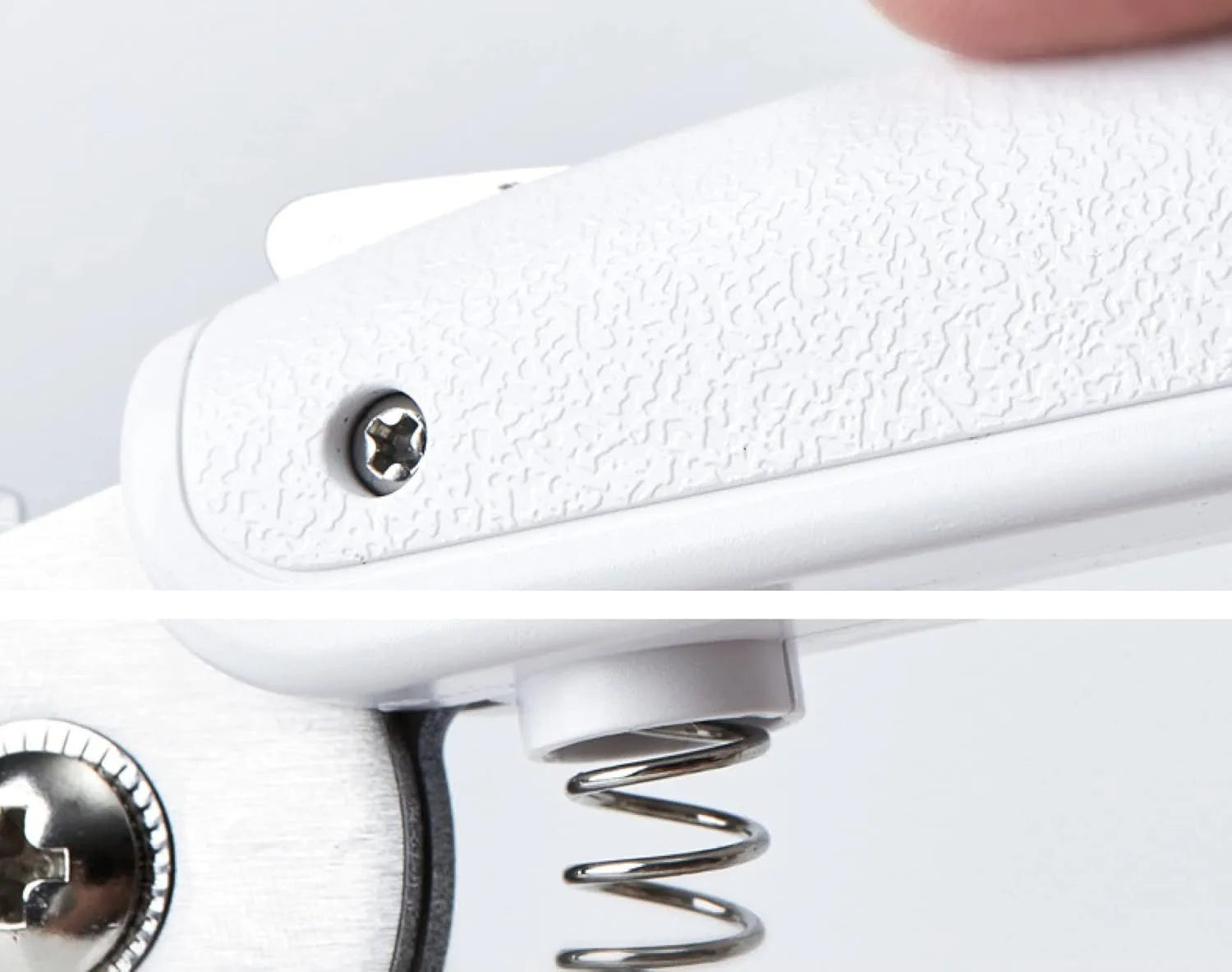 White pet nail clippers with LED light, transparent anti-splash guard, and leather-like handle on a table