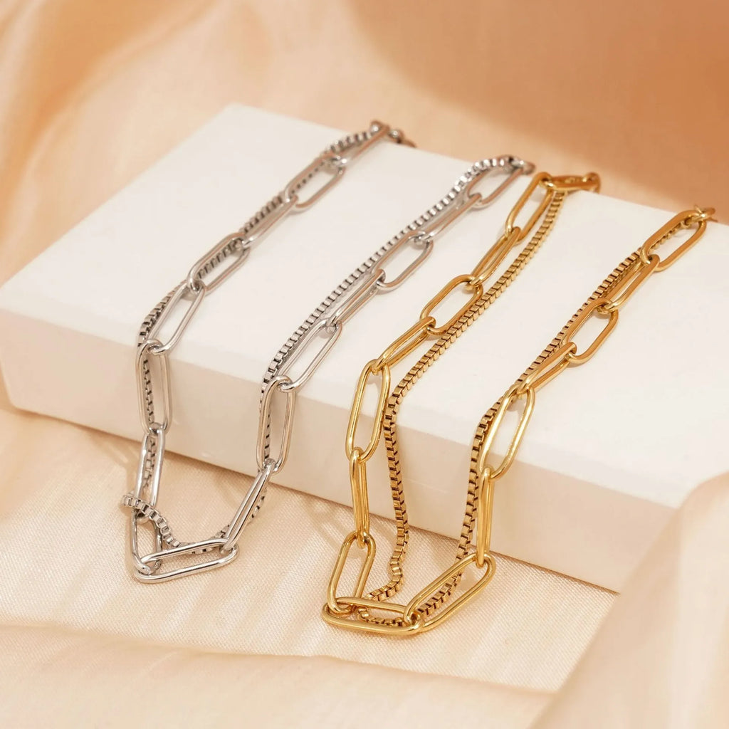 Geometric women's bracelet with twin titanium steel double-layer construction in gold or silver finish