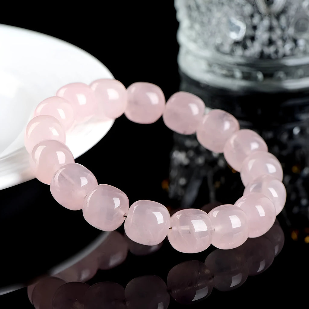 Pink natural bamboo crystal bracelet with 11x12mm barrel beads and geometry design