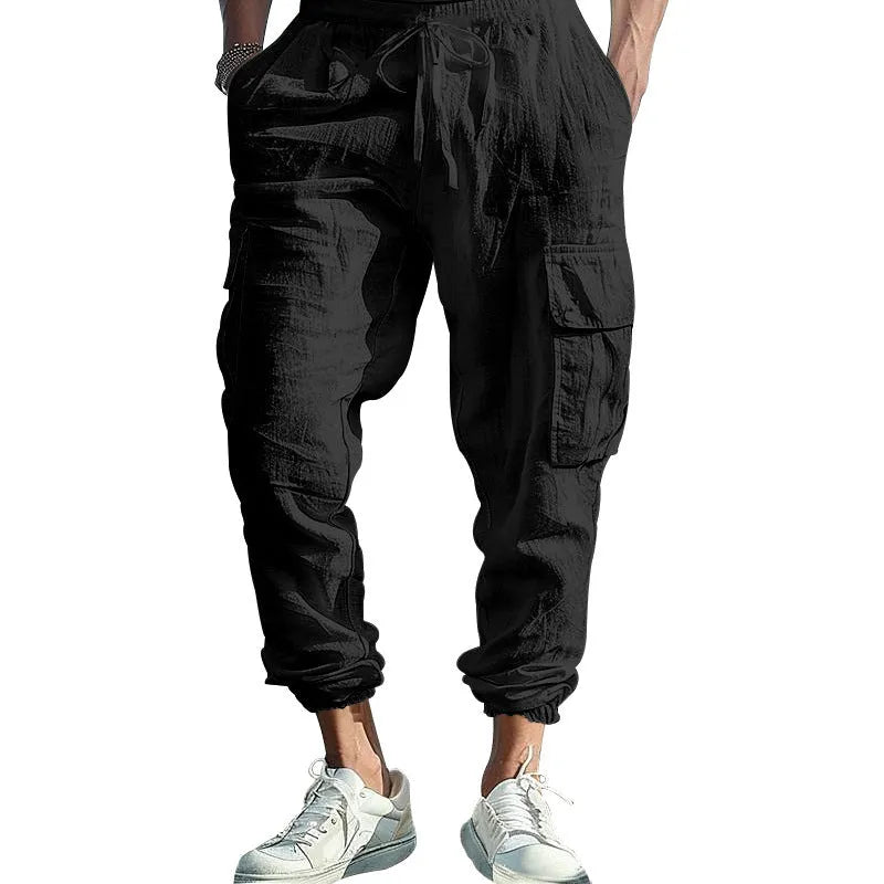 Men's linen trousers with ankle ties and multiple pockets in army green colour