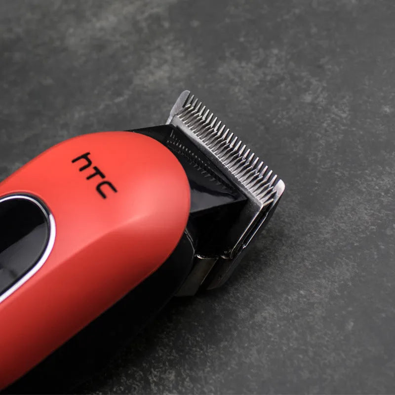 Professional digital electric hair clipper in black, red, or white colour with 4 limiting combs and accessories.