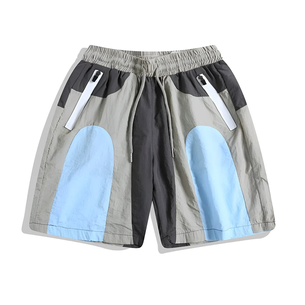 Blue patchwork quick-drying men's shorts with loose straight-leg fit and elasticated waist.