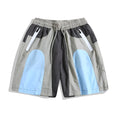 Blue patchwork quick-drying men's shorts with loose straight-leg fit and elasticated waist.
