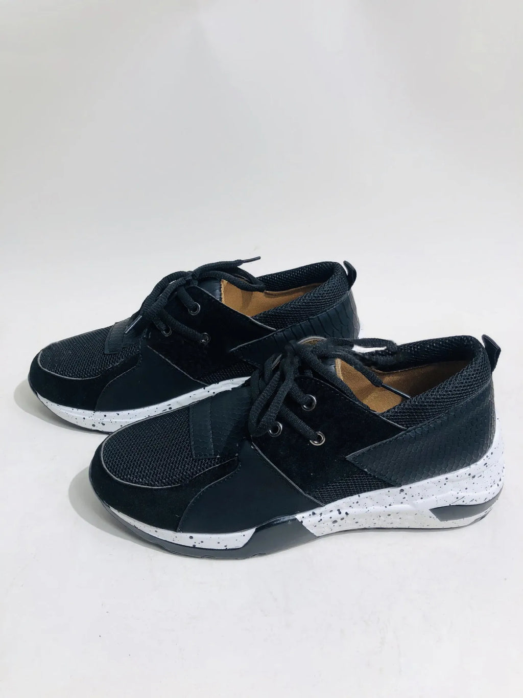 Women's casual suede sneakers with wedge heel in leopard print and black colour options