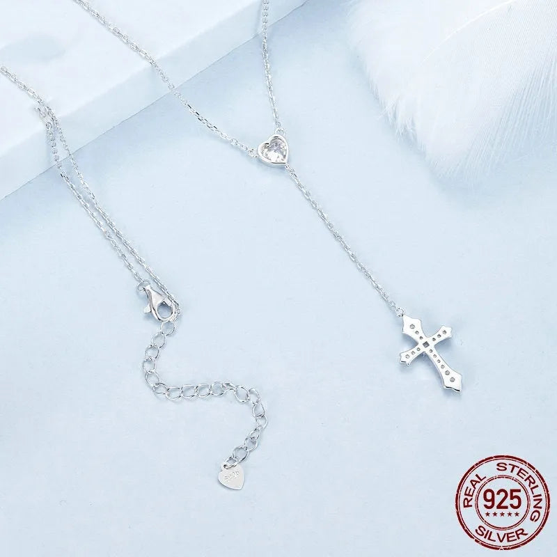 925 sterling silver Love Cross pendant necklace with V-neck design on an O-ring chain.