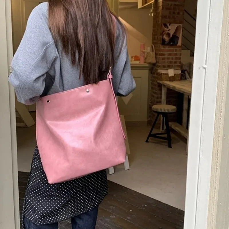 Corduroy one-shoulder commuter bag in pink or brown colour options