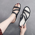 Solid colour women's casual beach sandals made from breathable PP material on a summer background.