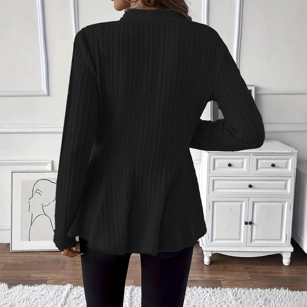 Women's apricot coloured knitted cardigan with one button and a textured Jacquard pattern