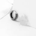 Silver geometric earrings with retro twist design and titanium steel construction
