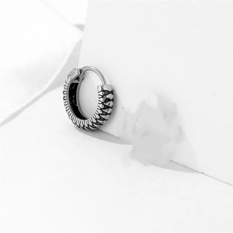 Silver geometric earrings with retro twist design and titanium steel construction