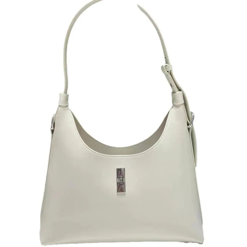 Genuine leather crossbody shoulder bag in dumpling shape with internal organiser compartments