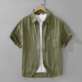 Loose casual lyocell top in cardigan style with short sleeves available in black green purple colours