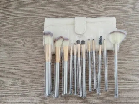 Persian make-up brush set with rice white bristles and champagne-coloured handles displayed in 12, 18, and 24 piece options.