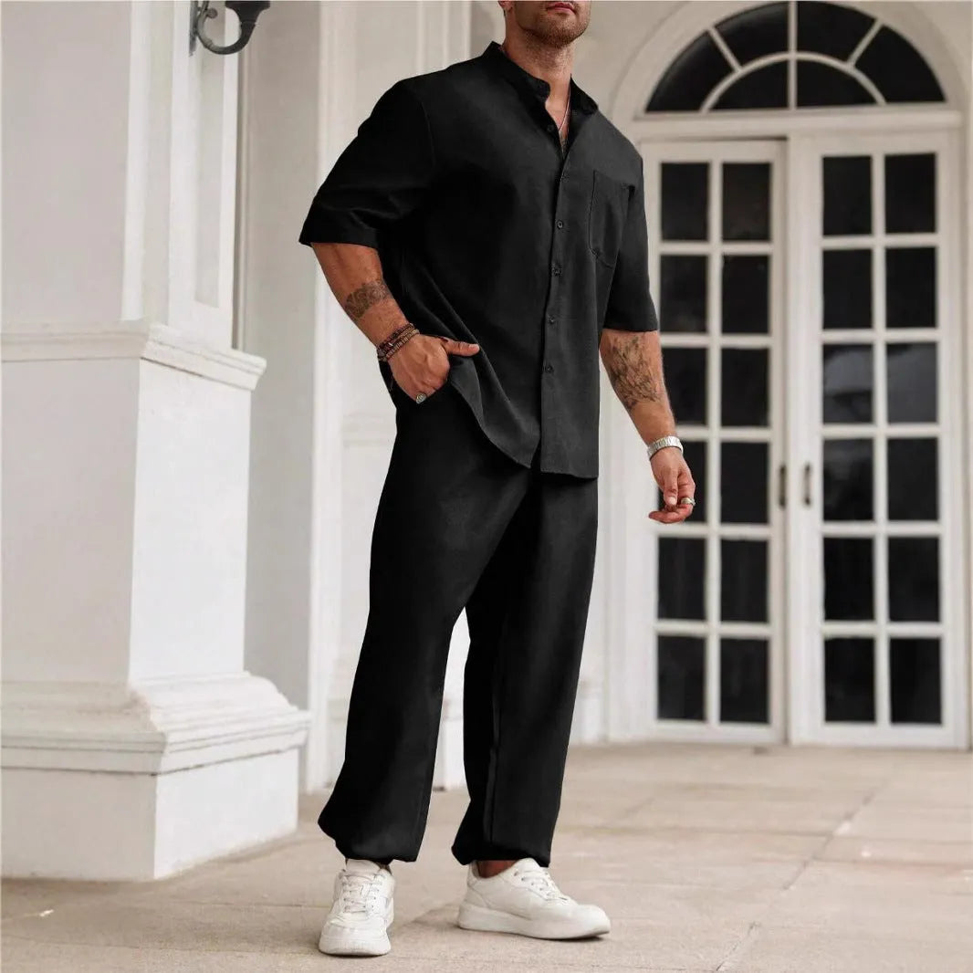 Men's apricot coloured cotton linen short-sleeved shirt jacket and trouser casual set laid flat.