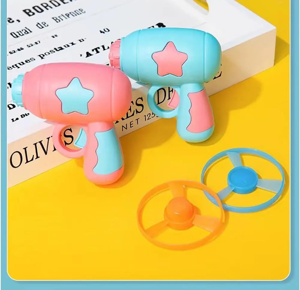 Blue or pink plastic cat toy gun with frisbee for indoor cat play
