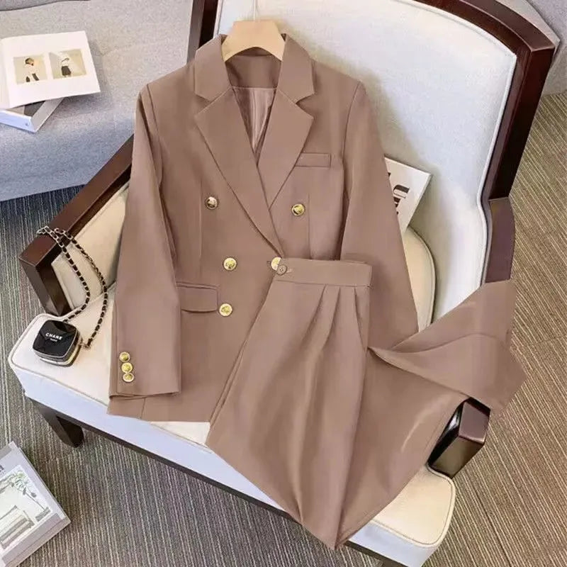 Women's loose-fit polyester blouse in beige, shown on a hanger.