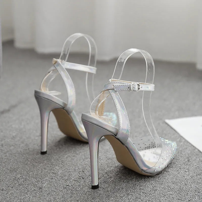 Women's pointed toe sandals with stiletto heels and diamond detail in glossy PVC material