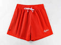 Men's black double-layer mesh sports shorts made from polyester fabric on a white background.