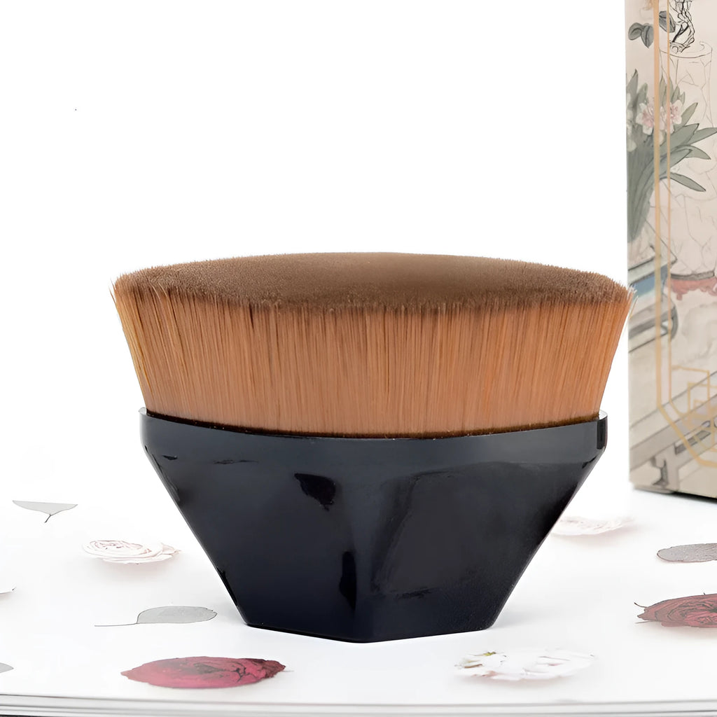 Sakura pink petal foundation brush with soft man-made fibre bristles and a clear storage box