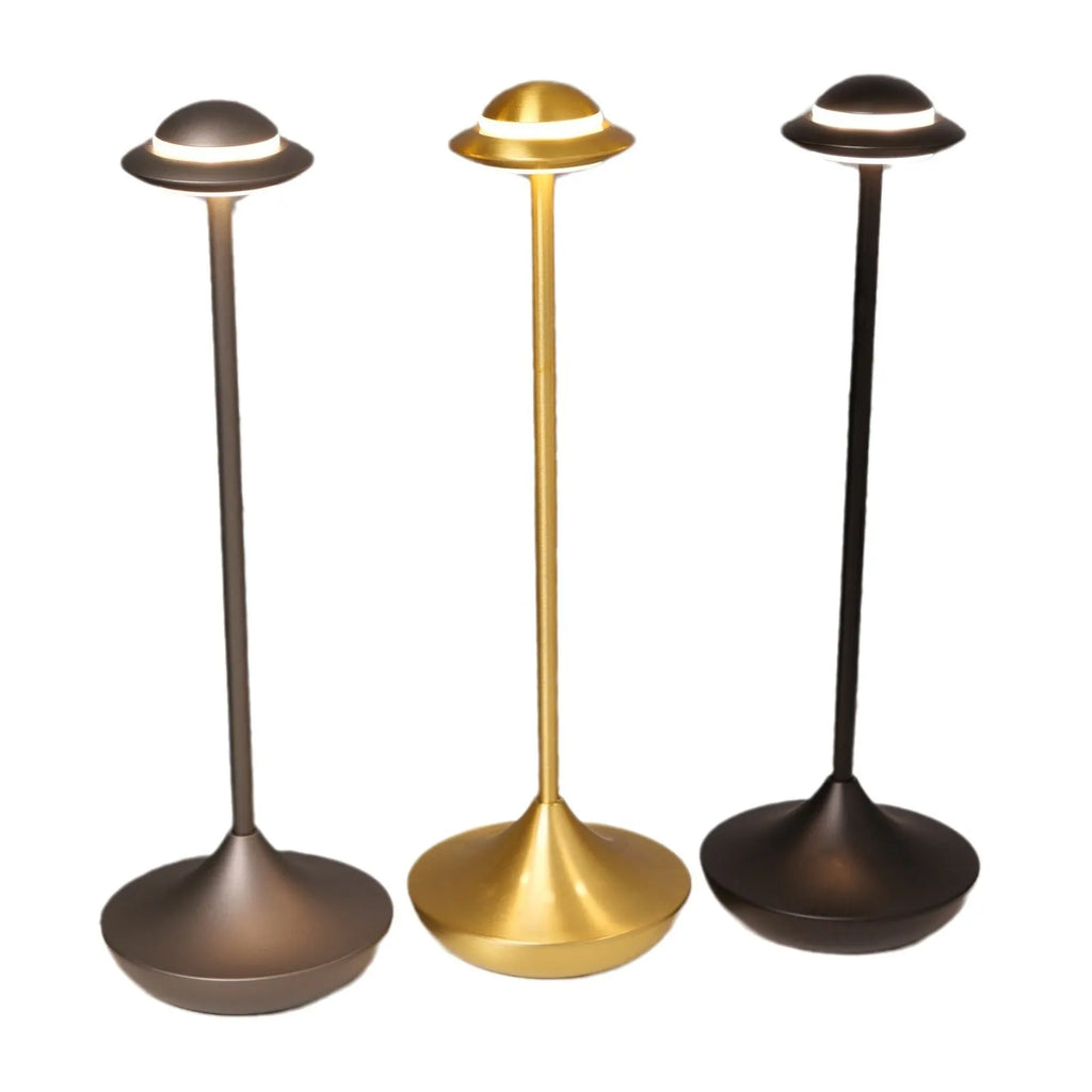 Metallic UFO-shaped desk lamp with touch dimming in black, gold, or grey colour options