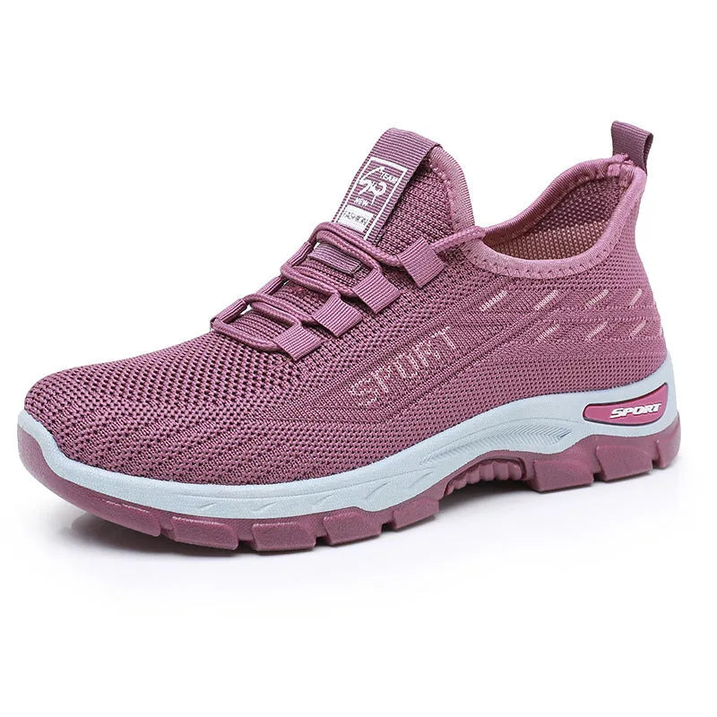 Low-top casual sneaker with a rounded toe and a lightweight PVC sole in multiple colour options.