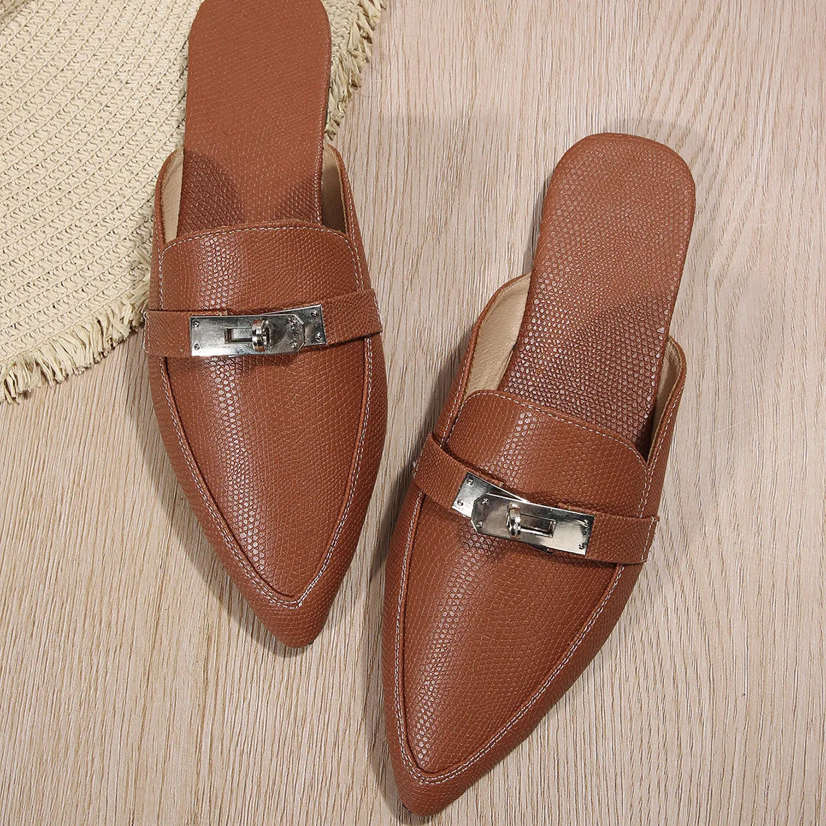 Light brown women's pointed-toe low-heel semi-slippers with a PU upper and rubber sole.