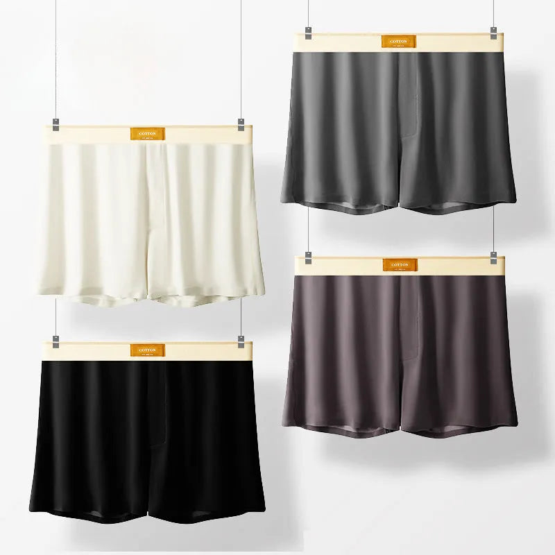 Pack of three men's solid colour loose fit nylon ice silk underwear in mid-waist style.