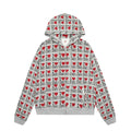 Women's melange grey cotton hooded cardigan with a retro autumn pattern, shown in a street fashion style.