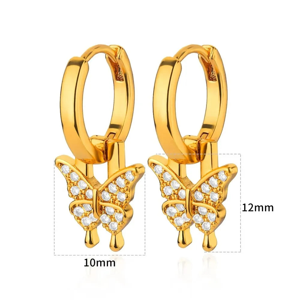 Women's copper earrings with geometric butterfly designs in heart, bow, and star shapes
