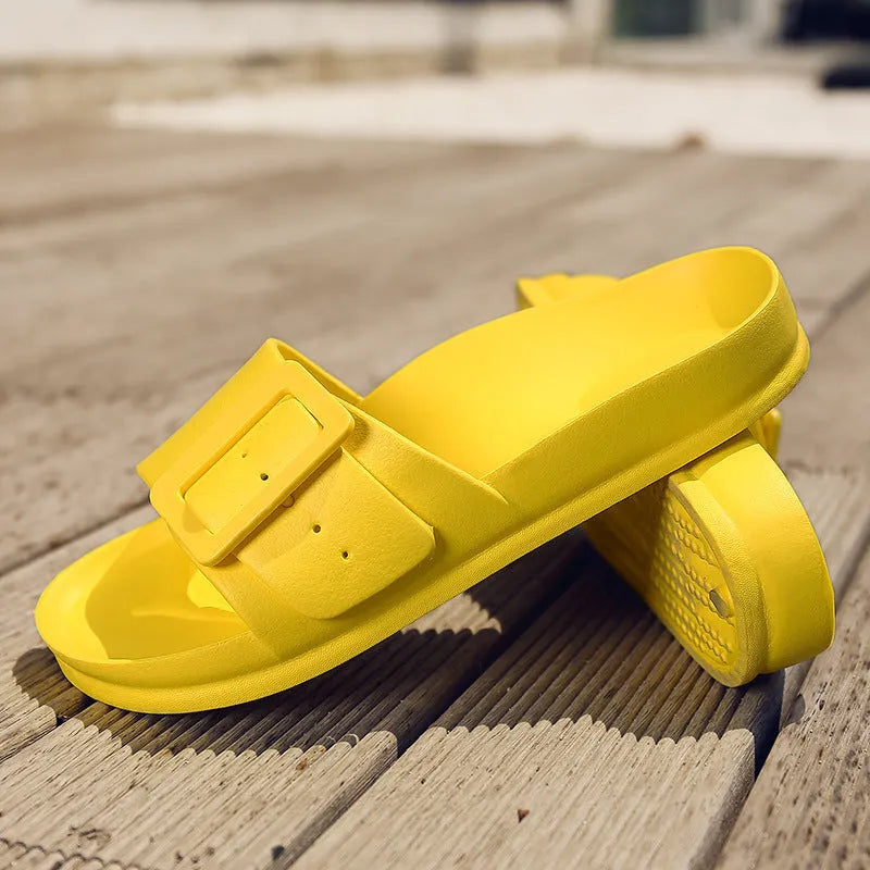 Women's EVA buckle fastening flip-flop slippers in assorted colours showing soft sole design