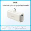 Small black capsule-shaped power bank with a foldable USB-C cable next to it