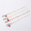 Cat wearing luminous collar with adjustable 29cm silicone chain and metal bell in night setting