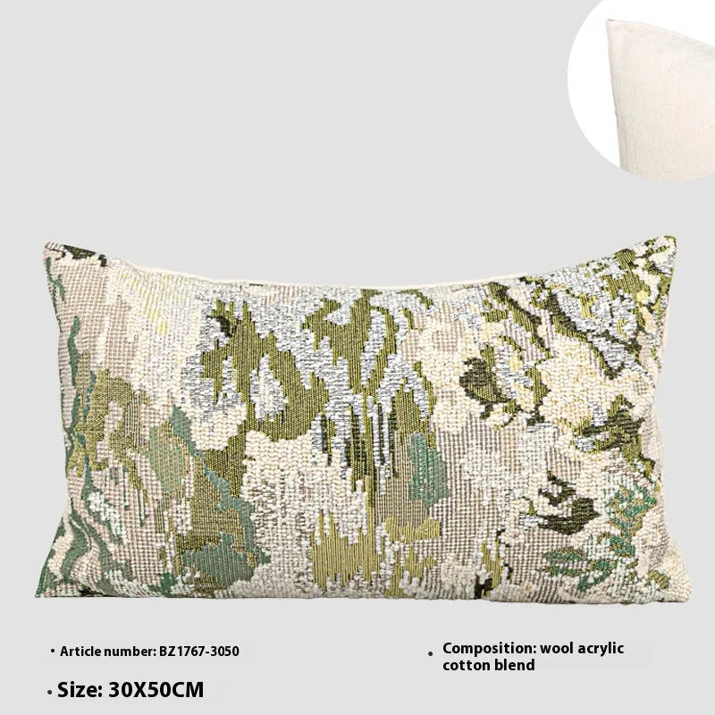 Green wool blend cushion with abstract French antique spring flower pattern, shown in square and rectangular sizes.