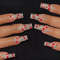 Red diamond and small cherry pattern French tip nail art stickers in a pack of 24 with adhesive glue.