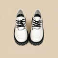 Women's Duke Asterism preppy loafers with a cross shoulder strap and metal detail.