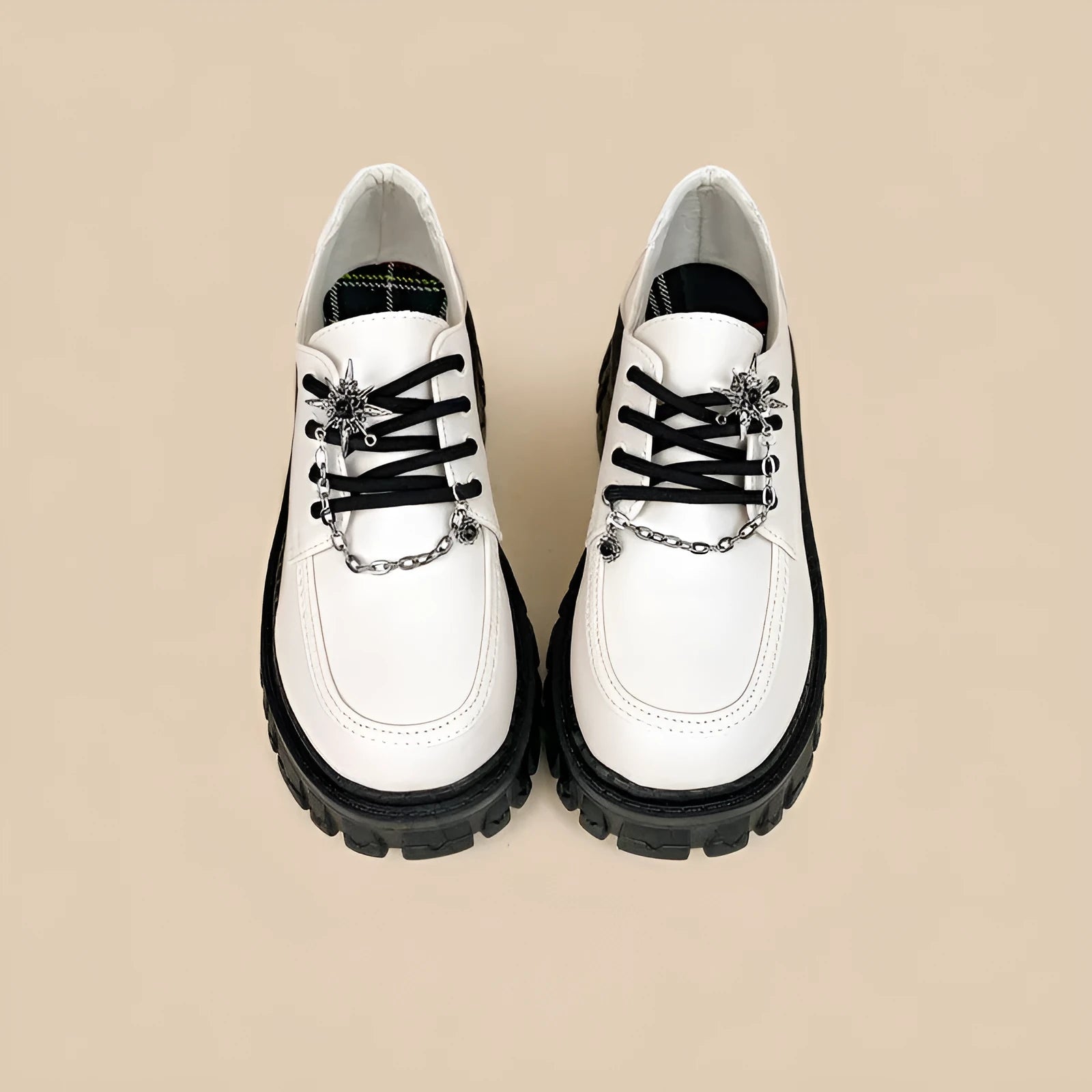 Women's Duke Asterism preppy loafers with a cross shoulder strap and metal detail.