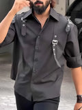 Men's black utility style button-up shirt with regular fit, made from polyester for daily casual wear.