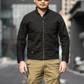 Men's tactical outdoor jacket in camouflage pattern with multiple pockets