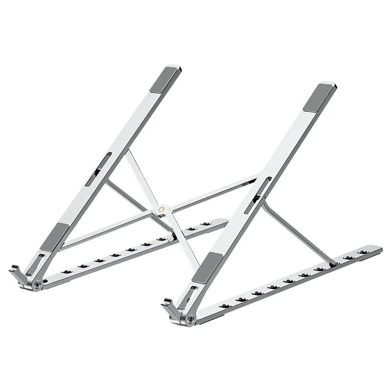 Grey folding aluminium alloy laptop bracket with silicone grip on a desk, angled to hold a notebook