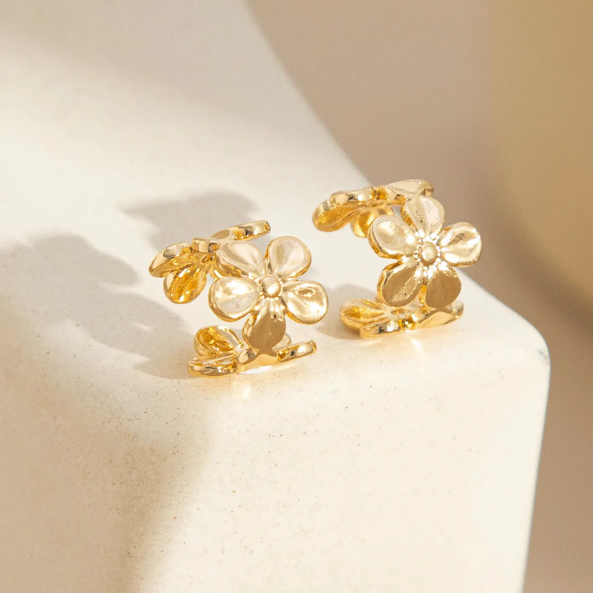 Gold electroplated alloy earrings with starfish and scallop shell charms