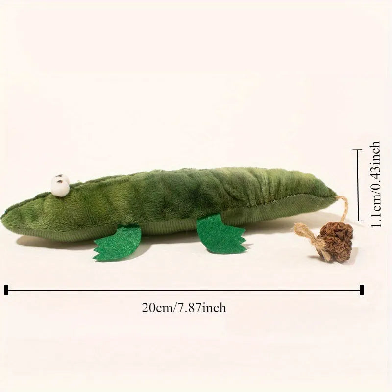 Green plush alligator catnip toy with peppermint scent for feline oral cleansing