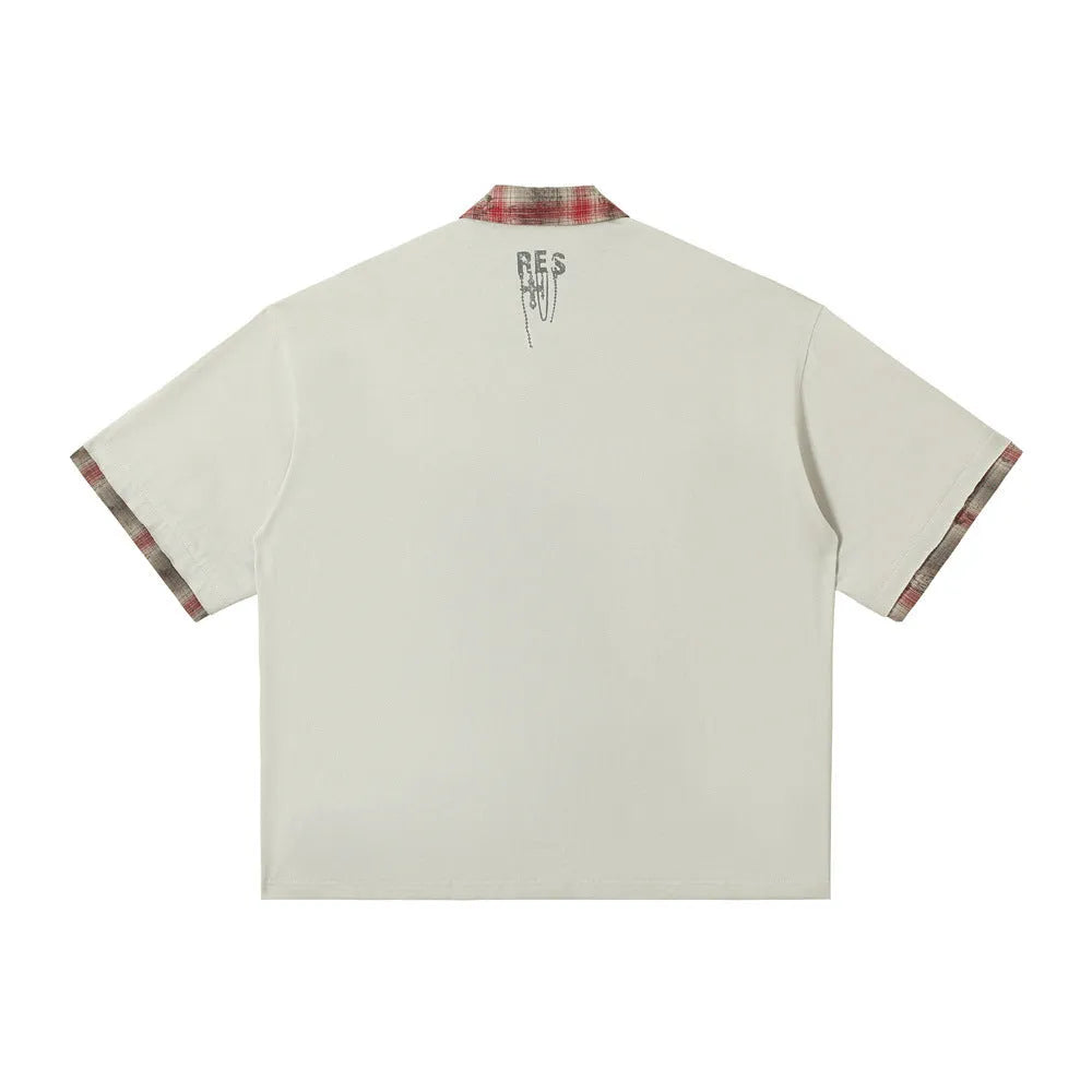 Men's loose fit cotton top with graffiti print on lapel and asymmetric design in blue or red.