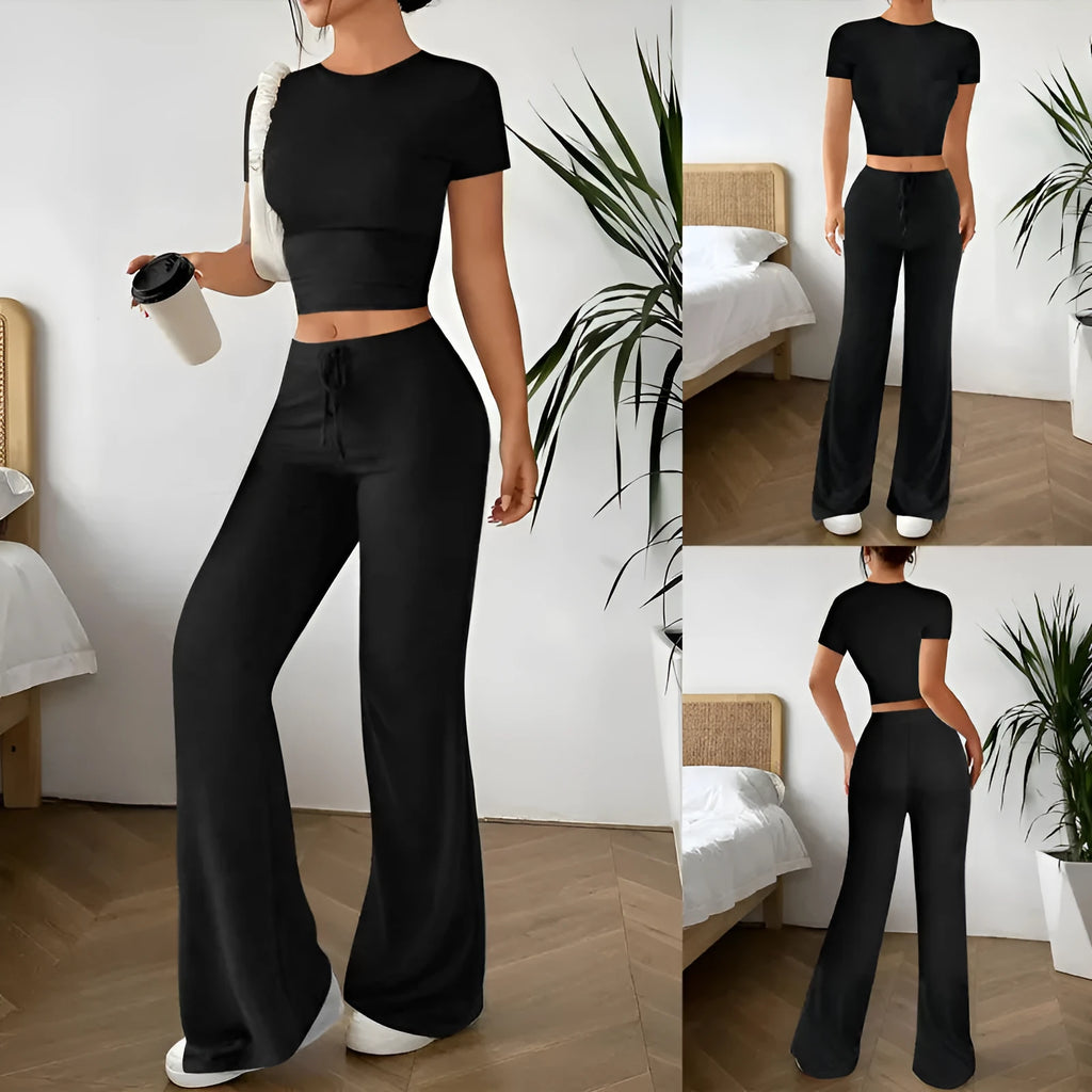 Black high waist trousers and short sleeve t-shirt women's co-ord set on a hanger
