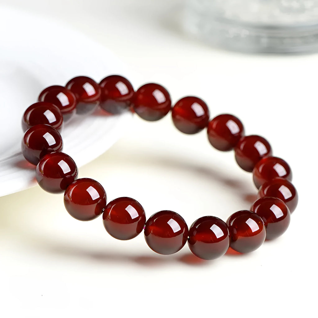 Natural orange red garnet crystal bracelet with Ruyi design elements in retro style